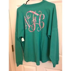 Green Monogrammed “NCF” spirit jersey